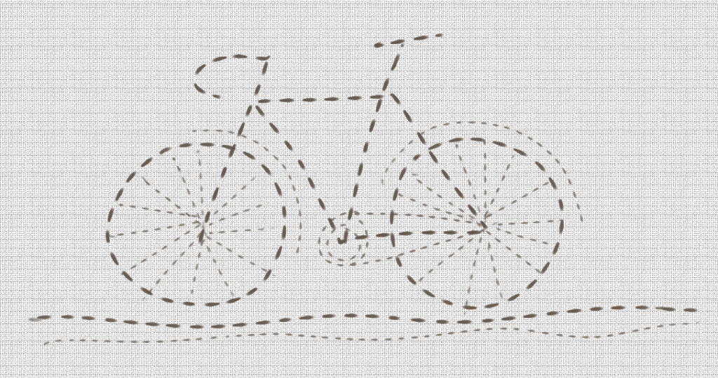 A dotted outline of a bike on a cloth background