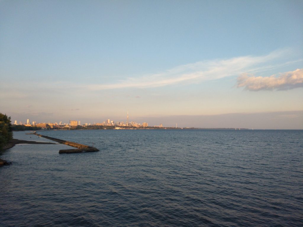 The Toronto waterfront at sunset, as seen from the Humber River pedestrian bridge