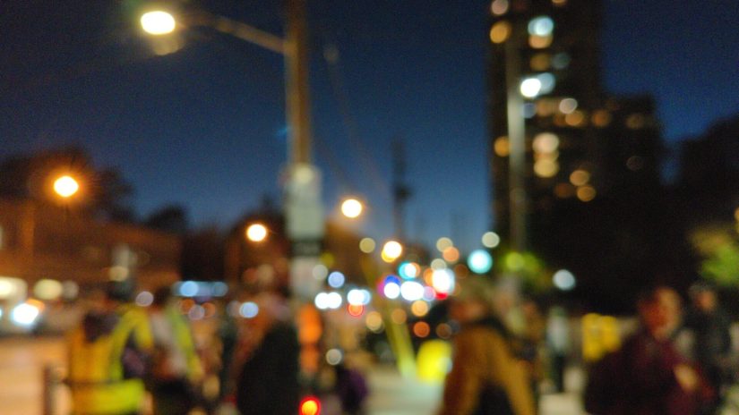 Protesters gathering in the evening of Oct. 21, an hour later than the day before, so the sun has just set. Blurred for privacy.
